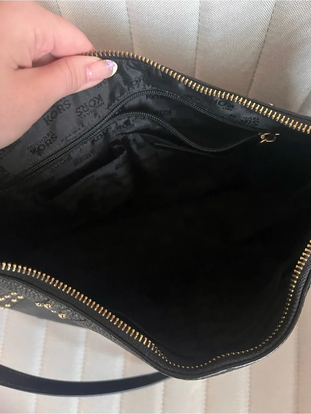 Michael Kors Black Leather Shoulder Bag with Gold Hardware and Stud Accents